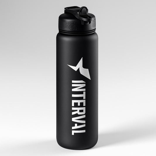 Black water bottle with 'Interval' logo on a light gray background