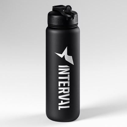 Black water bottle with 'Interval' logo on a light gray background
