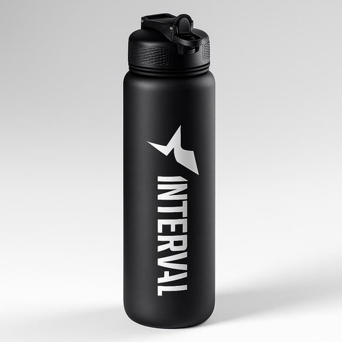 Black water bottle with 'Interval' logo on a light gray background